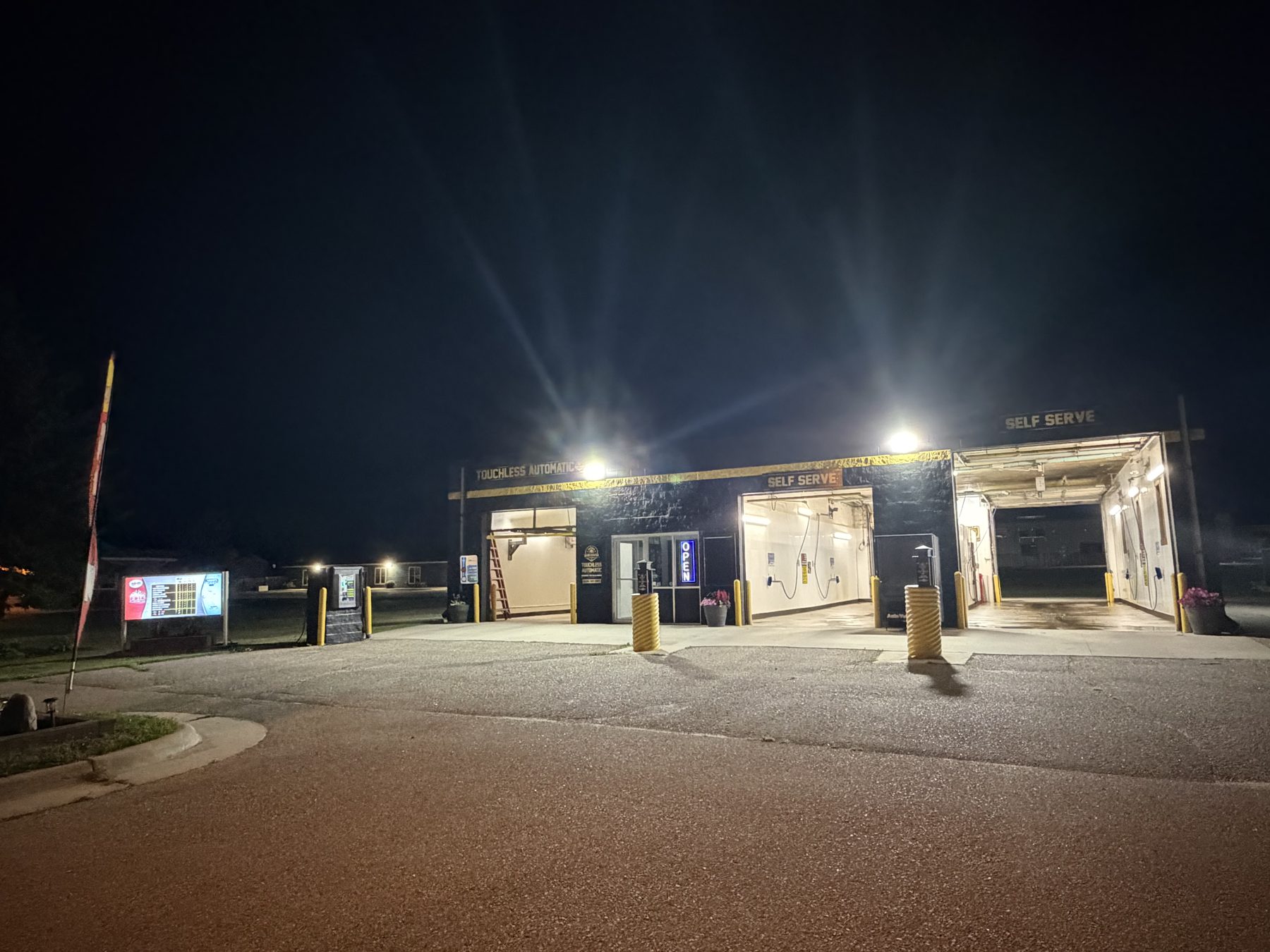 Bear Country Wash exterior lit up at night — open 24/7 in Byron, MN