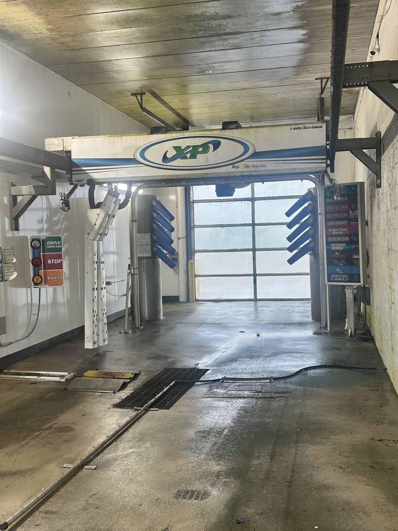Touchless automatic wash tunnel interior with XP wash equipment